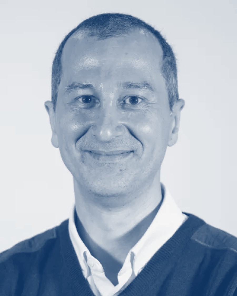 Yuksel Aydin, Founder of HCSK Inc., the author of this report: a studio portrait.